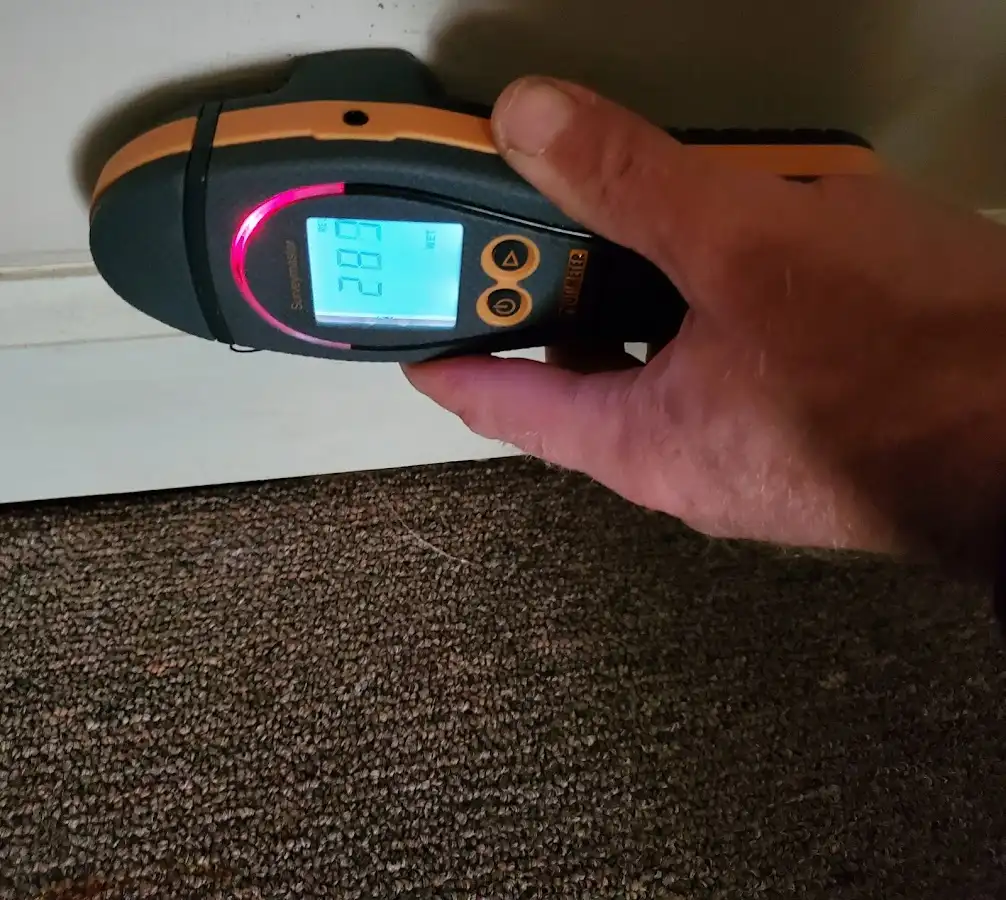 Moisture detection at baseboard during Storm Damage Restoration in Leavenworth
